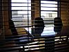 View through blinds into boardroom